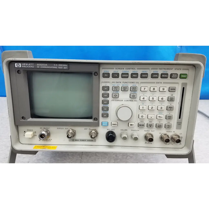 Gray hewlett packard 8920a rf communications test set with small screen and multiple control buttons for communications test