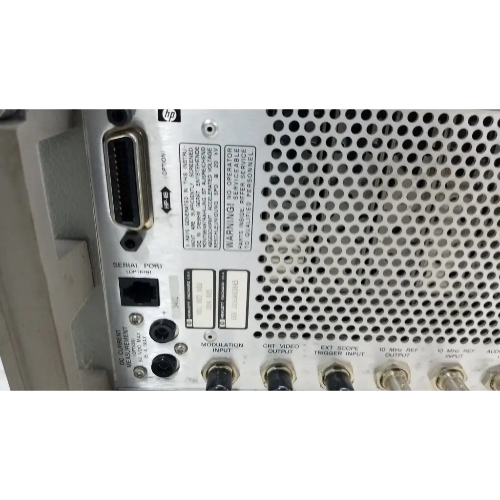 Back side of hp hewlett packard 8920a rf communications test set showing perforated metal panel and input output ports