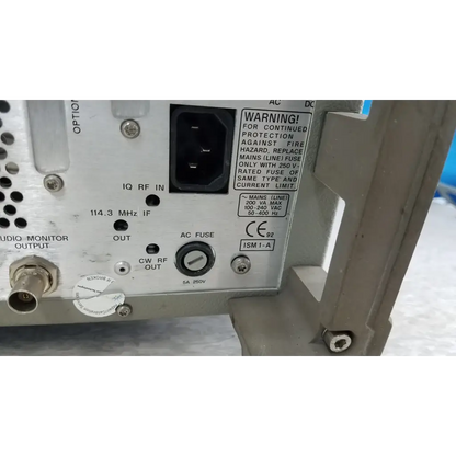 Back side of gray metallic hewlett packard 8920a communications test set with labeled rf connectors and black power port