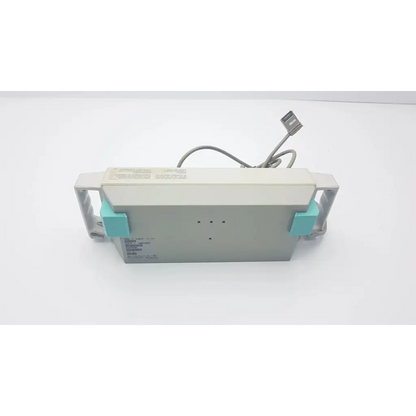 Gray and teal m1041a intellivue information center module rack with coiled cable and usb connector shown from back side