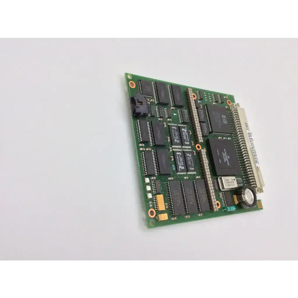 Green telemetry interface card module by hp featuring black integrated circuits and a silver connector on circuit board