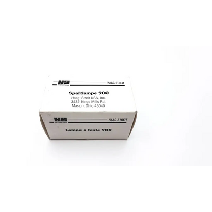 White cardboard box labeled spaltlampe 900 by haag-streit usa inc for hs international microscope 0900.0930 slit lamp ad4-171