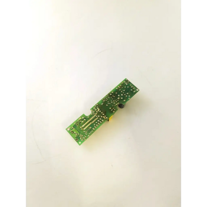 Green rectangular circuit board with silver soldered components and black cylindrical part for hsc-6-30nc microscope power supply