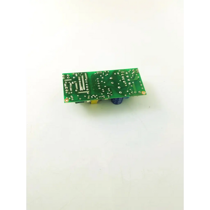 Green rectangular hsv-12-50l control board with silver solder points and various electronic components