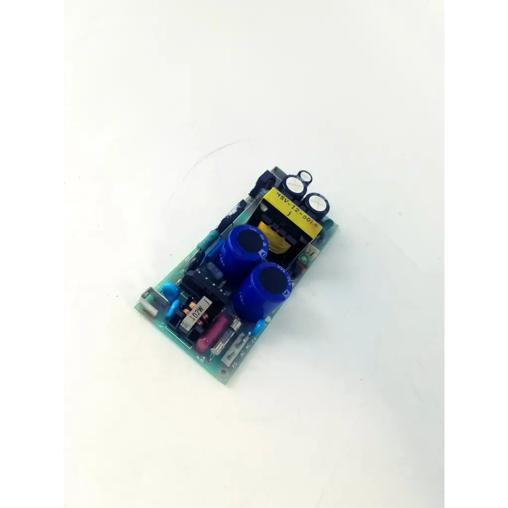 Green circuit board with blue capacitors and yellow labeling of hsv-12-50l control board for precise control functions