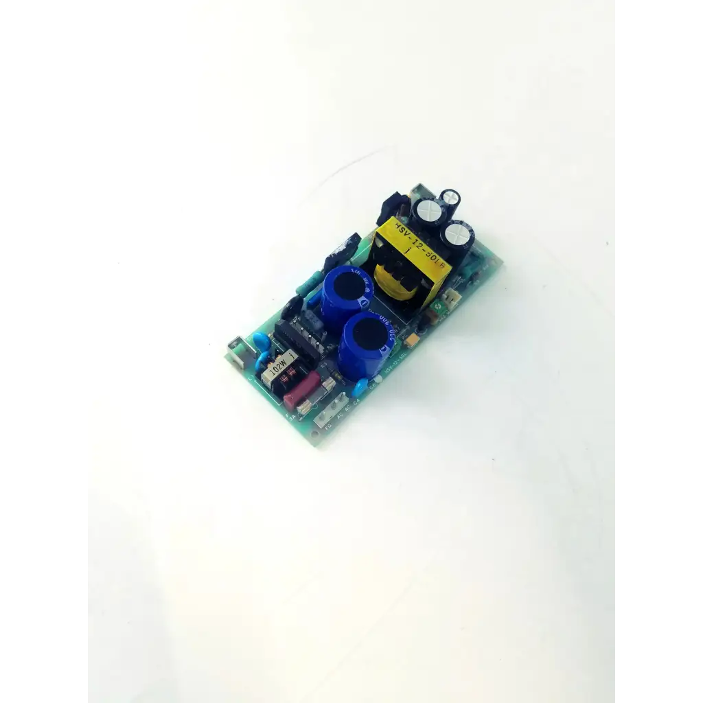 Green printed circuit board with blue capacitors yellow transformer and black components in hsv-12-50l control board