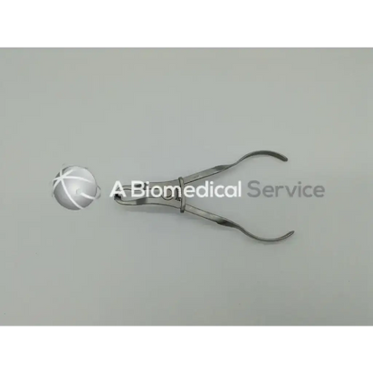 Silver hu-friedy rdf plier 888 0613 with curved precision jaws and central pivot for dental extraction use