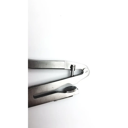 Silver-toned metal Hu-Friedy RDP 888 0213 rubber dam punch with textured grip handle and adjustable clamping for biomedical service