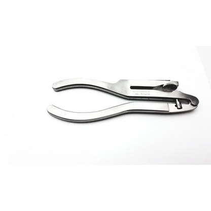 Silver-toned hu-friedy rdp 888 0213 rubber dam punch with textured adjustment knob and ergonomic handles for biomedical service