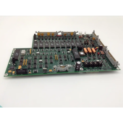 Green humphrey instrument pcbf printed circuit board with black integrated circuits orange capacitors on rev a2 board