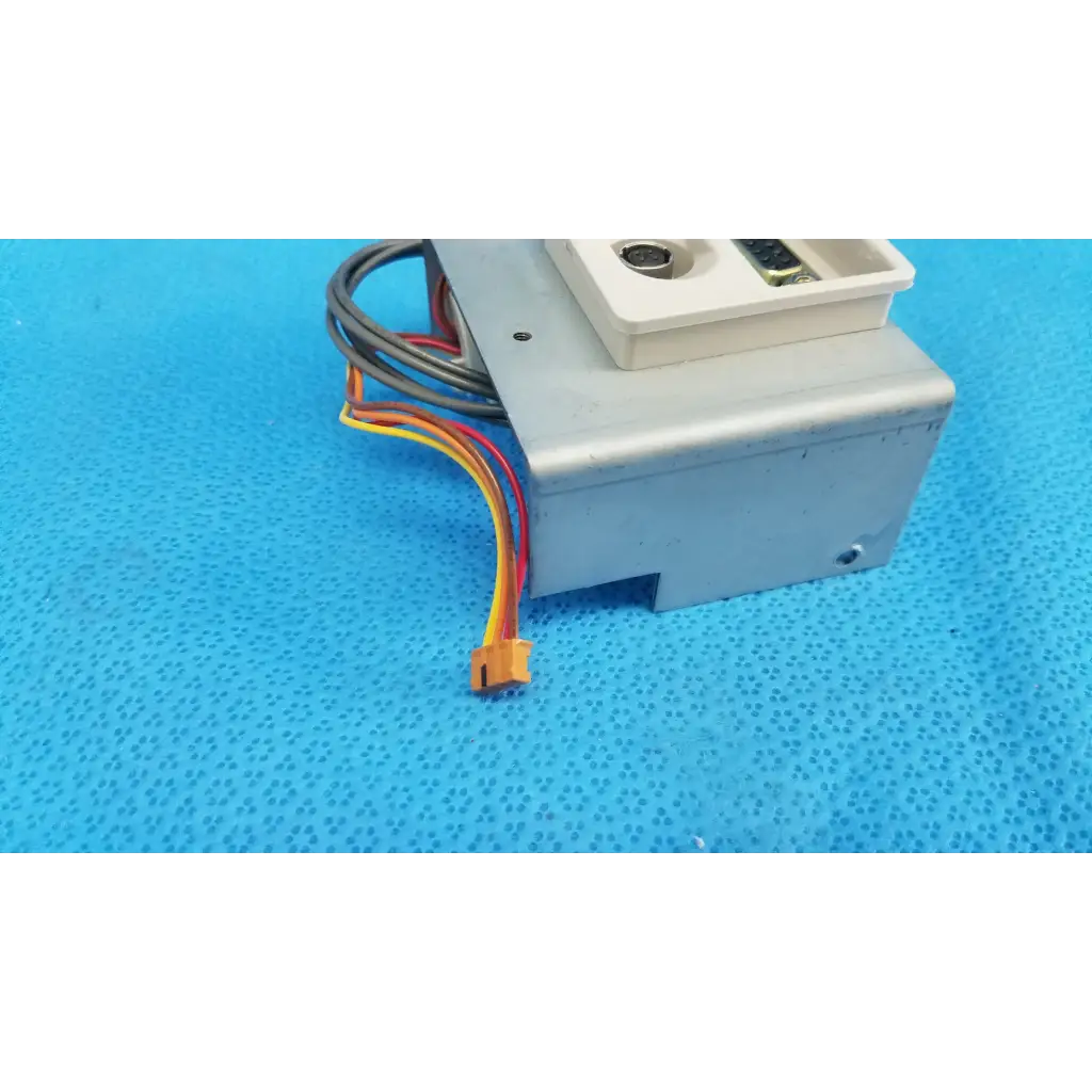 Gray plastic i/o data port interface panel chassis assembly with beige control panel and multi-colored wiring for topcon retinal camera