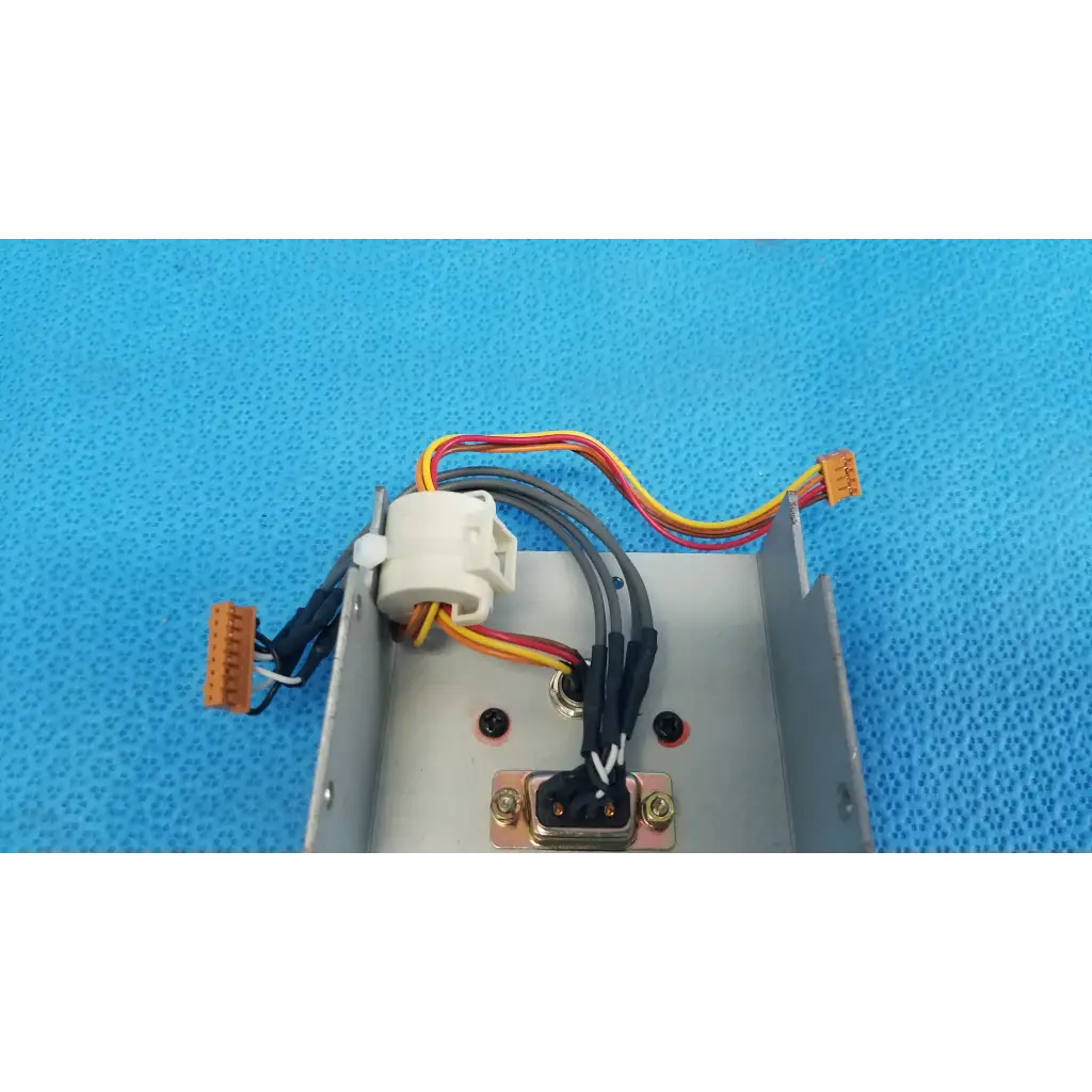 Gray metal i/o data port interface panel chassis assembly with white connector and multicolored wiring for topcon retinal camera