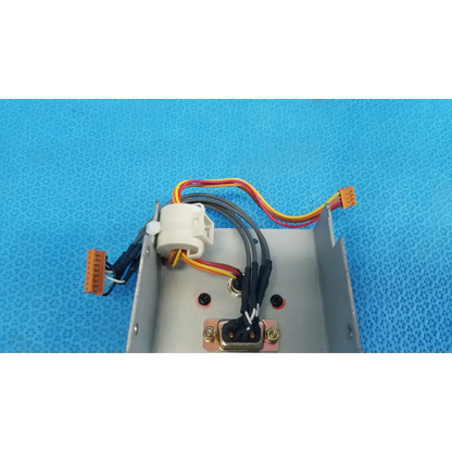 Gray metal i/o data port interface panel chassis assembly with white connector and multicolored wiring for topcon retinal camera