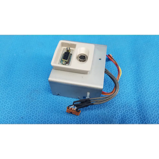 White plastic industrial interface panel chassis assembly with db9 mini-din connectors and multi-colored wires for topcon retinal camera