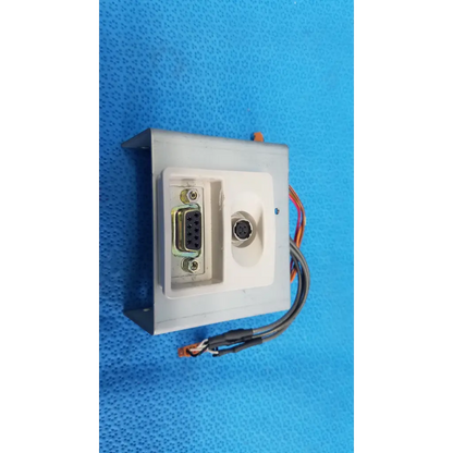 White plastic interface panel with db9 and mini-din connectors and multicolored wires for topcon trc-nw6s retinal camera