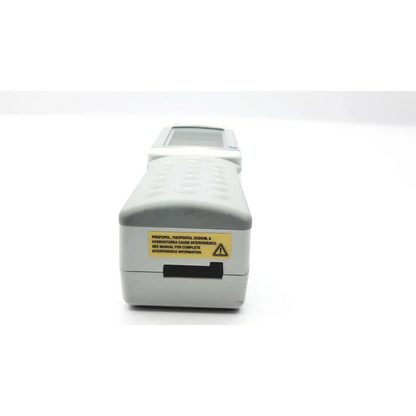 Gray i-stat 1 analyzer blood hematology portable device with small screen keypad and yellow warning label front view