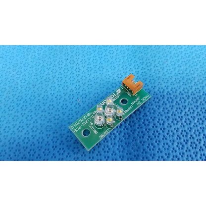 Green circuit board with five white led lights and orange connector for ILLUMI-PCB internal led illumination in Topcon camera