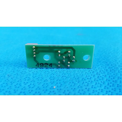 Green rectangular led illumination circuit board with silver solder points and two circular cutouts for topcon retinal camera