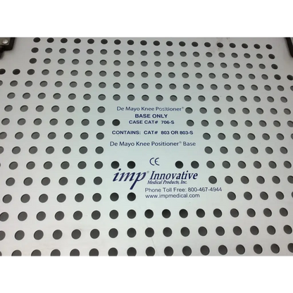 White perforated metal base for de mayo knee positioner in imp innovative 706-s small sterilization case
