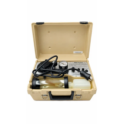 Beige hard-shell case with biomed certified impact 308 series portable suction unit including black hoses and gauges