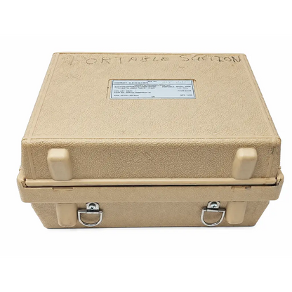 Beige textured hard-shell biomed certified case with metal latches labeled portable section for impact 308 series portable suction unit