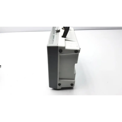 Gray plastic impact instrumentation portable ventilator with black handle and metallic knob for easy transport