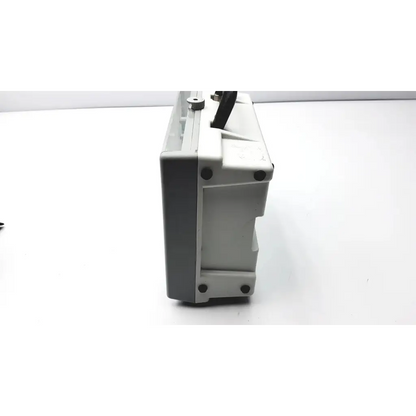 Gray plastic industrial-grade impact instrumentation uni-vent 754 portable ventilator with black handle and metallic screw cap