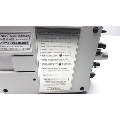 White industrial portable ventilator impact instrumentation uni-vent 754 with silver metallic ports and black text labeling