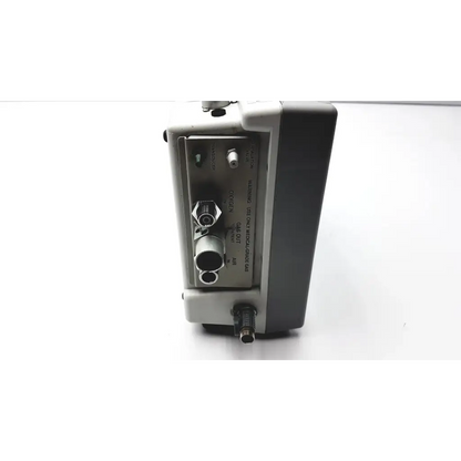 Gray and black industrial-grade audio interface with multiple ports on the back for impact instrumentation portable ventilator use