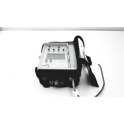 Black and silver impact instrumentation Uni-Vent 754 portable ventilator with knobs digital display and connected cables
