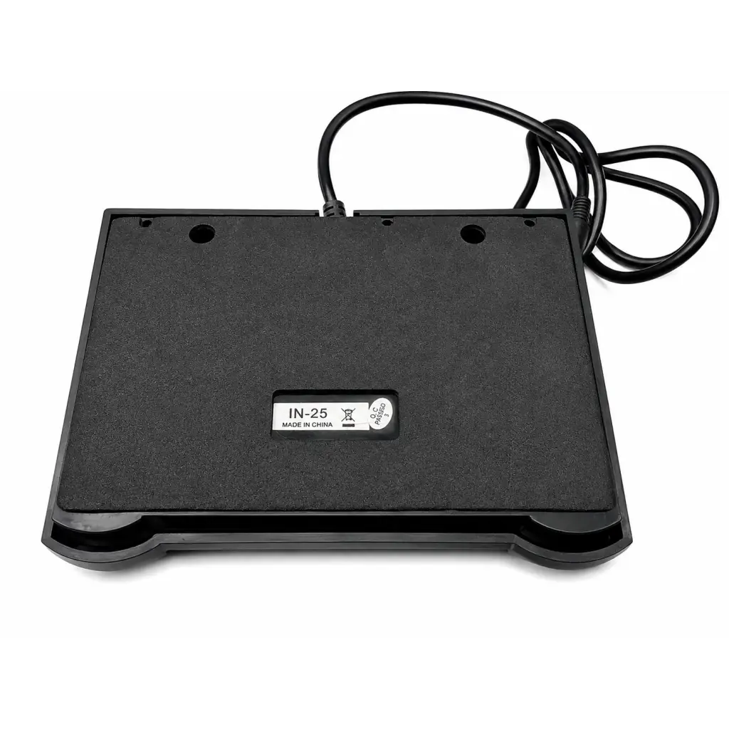 Black plastic biomed certified in-25 footswitch control pedal with coiled power cable and stand for medical use