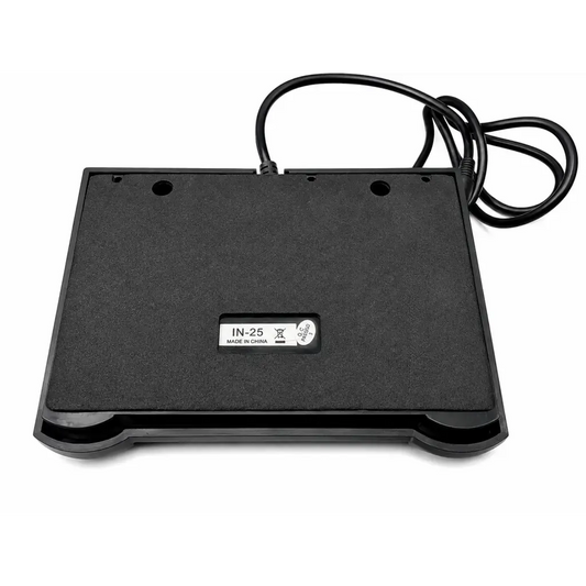 Black plastic in-25 footswitch control pedal with coiled power cable and stand for medical use