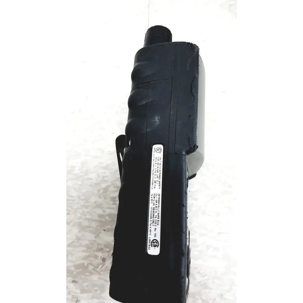 Black plastic industrial scientific ibrid mx6 multi gas monitor with textured grip and white label showing specifications