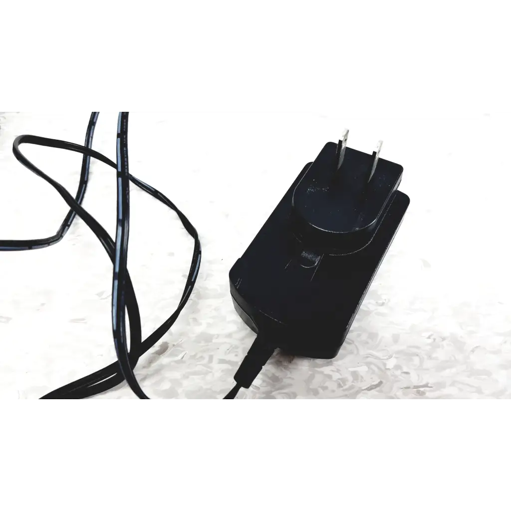 Black plastic power adapter with coiled cable and two-prong plug for industrial scientific ibrid mx6 multi gas monitor charger