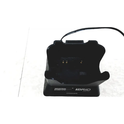 Black plastic charging dock labeled charger for industrial scientific ibrid mx6 multi gas monitor