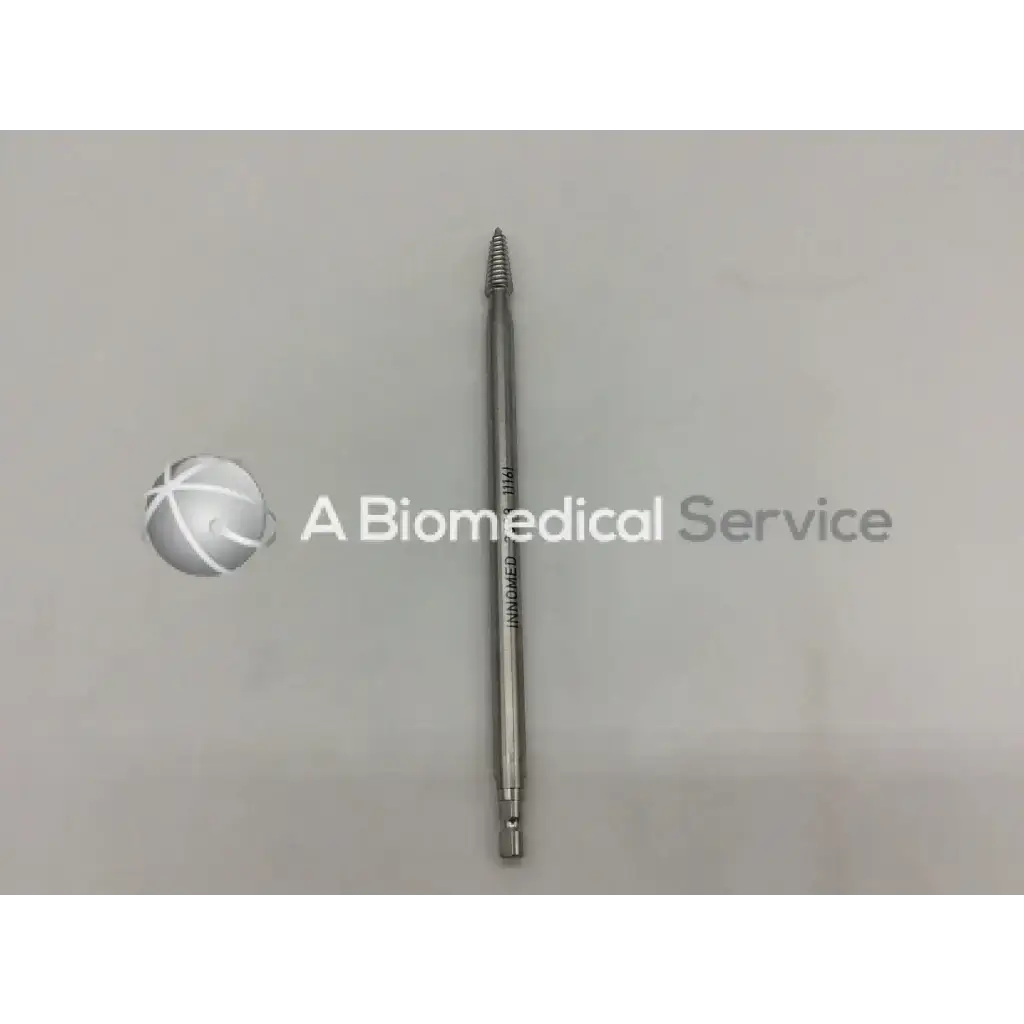 A metallic surgical femoral head remover quick connect screw with threaded tip and engraved markings