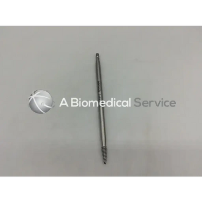 A metallic silver innomed 3688 femoral head remover quick connect screw with a threaded shaft engraved 3892 - 5601