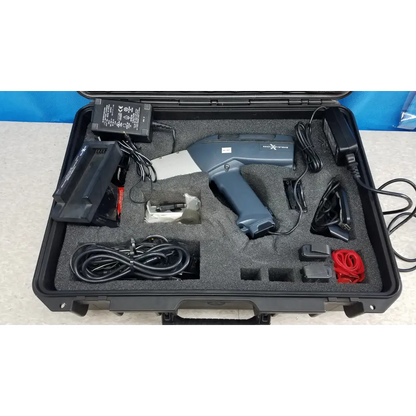 Gray handheld laser scanner with black grip and silver accent in protective case of innov-x systems a-4000 s analyzer spectrometer kit