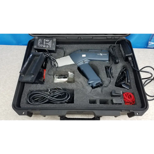 Gray handheld laser scanner with black grip and silver accent in protective case of innov-x systems a-4000 s analyzer spectrometer kit