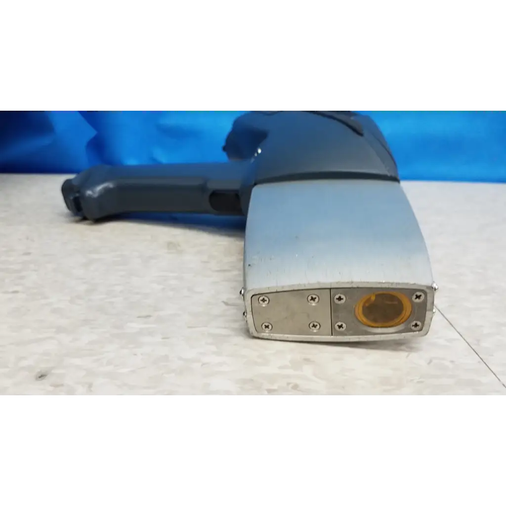 Gray and black handheld metal detector with silver front panel and orange lens in innov-x systems a-4000 s analyzer spectrometer kit