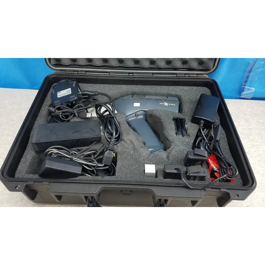 Gray handheld barcode scanner with ergonomic design in protective case with cables in innov-x systems a-4000 s analyzer spectrometer kit