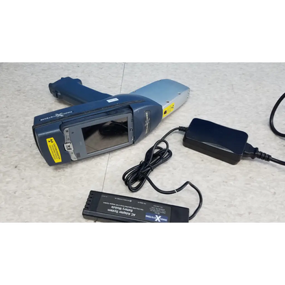 Blue innov-x systems a-4000 s alpha handheld analyzer spectrometer kit with small screen and yellow warning labels