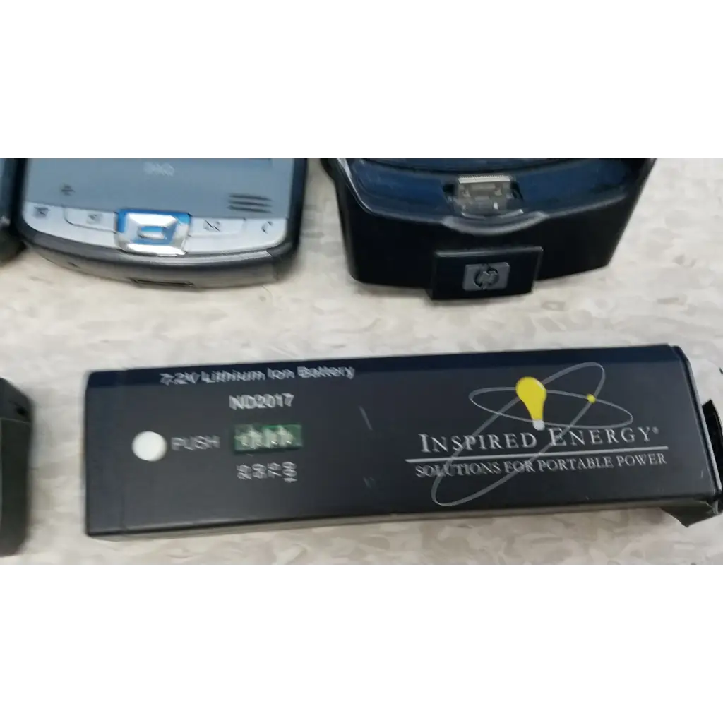 Black rectangular 7.2v lithium-ion battery with inspired energy branding for innov-x systems a-4000 s alpha analyzer spectrometer kit