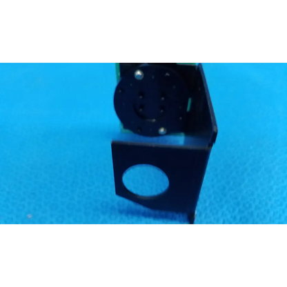 Black plastic internal fixation target circuit board with circular cutout and screw holes for topcon retinal camera