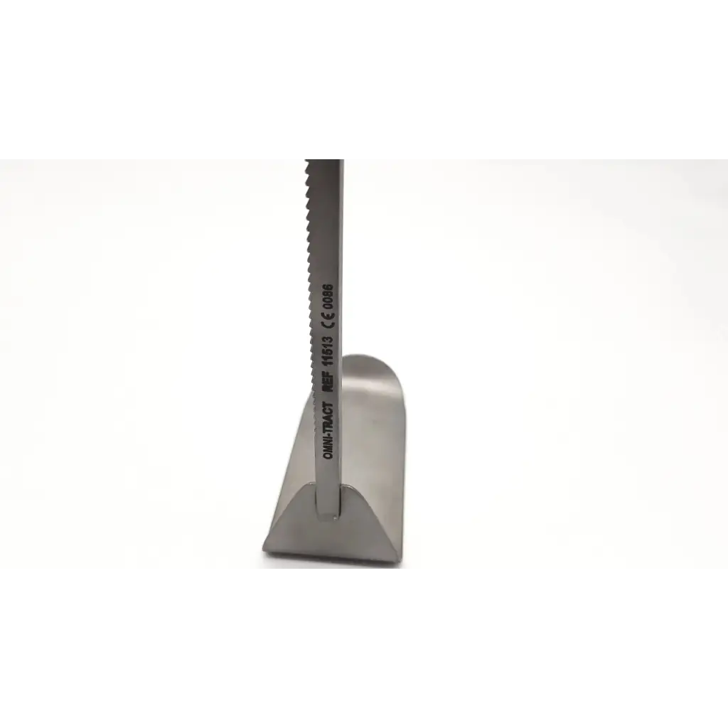 A sleek metallic integra jarit kelly fixed retractor blade with fine teeth and engraved markings in stainless steel