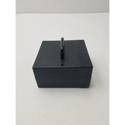 Black rectangular magnetic base with central handle for integra padgett model s electric dermatome power supply unit