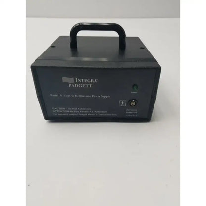 Black integra Padgett model S electric dermatome power supply with handle and green power indicator light for dermatome power