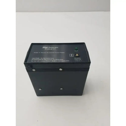 Black rectangular integra padgett model s electric dermatome power supply with green power indicator and labeled ports