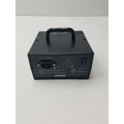 Black rectangular electric dermatome power supply with top handle and labeled specifications on back panel of integra padgett model s