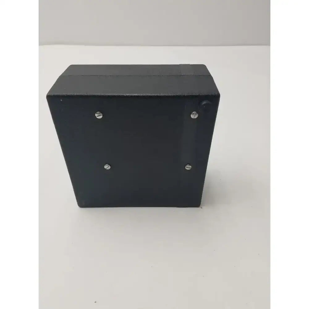 Black rectangular box with silver screws on the sides for integra padgett model s electric dermatome power supply back side